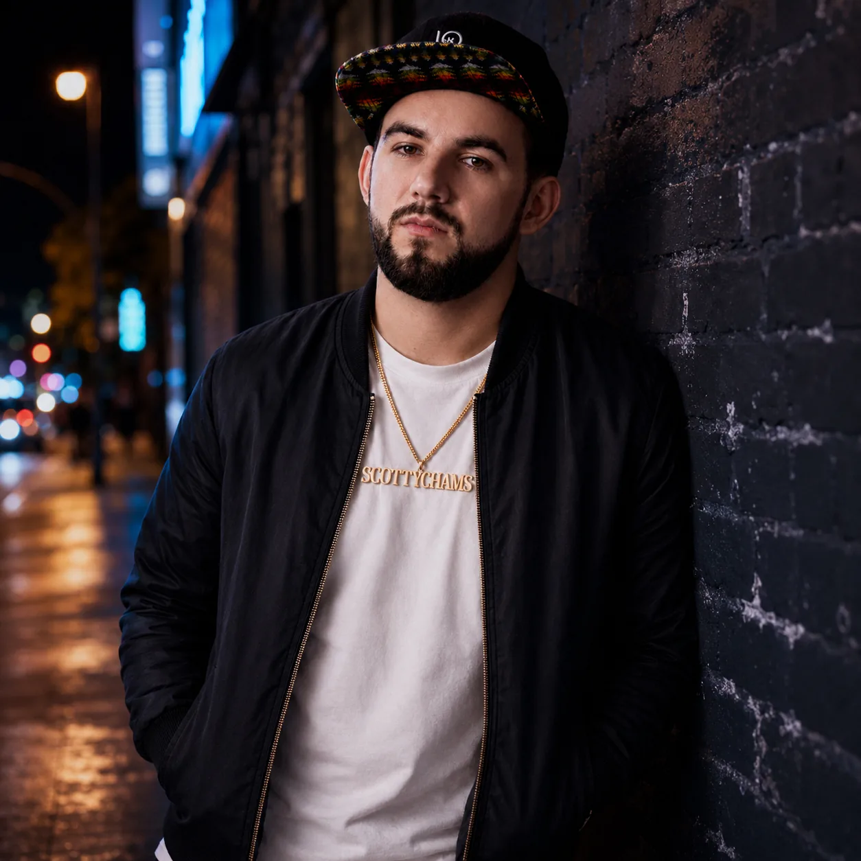 Scottychams against a brick wall